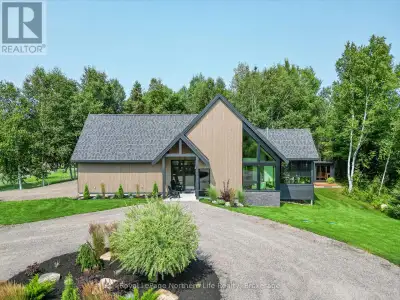 Welcome to 466 Ouellette Road, East Ferris - an architecturally designed, Scandinavian-inspired resi...