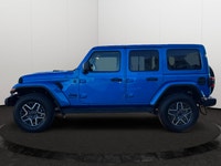 This 2025 JEEP WRANGLER 4-DOOR SAHARA has the following options Cloth Low-Back Bucket Seats, Remote... (image 1)
