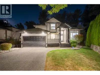 BEAUTIFULLY UPDATED EXECUTIVE FAMILY HOME BACKING ONTO GREENBELT & KANAKA CREEK! This meticulously m...