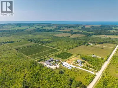 Perched on the rolling hills of Annan, Ontario, between two historic ghost towns and overlooking Geo...