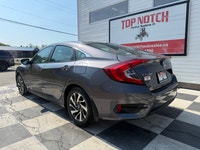 A modern compact sedan with upgraded convenience features, efficient performance, and a comfortable... (image 5)