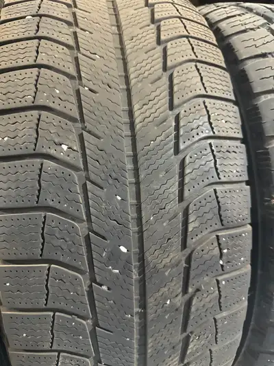 FOUR USED 265/60R18 MICHELIN LATTITUDE X-ICE WINTER TIRES In good condition two tires at 6/32 and tw...