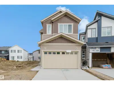 Welcome to this incredible brand-new home in the vibrant community of Uplands, crafted for modern lu...