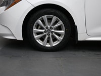 The 2023 Toyota Corolla LE Upgrade is powered by a 2.0L 4-cylinder engine paired with a CVT and fron... (image 3)
