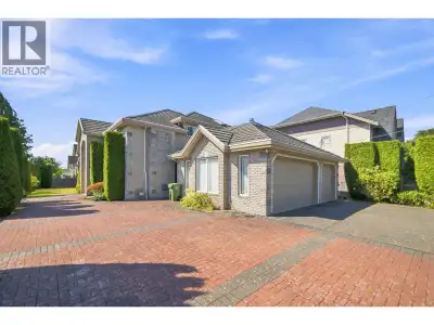 Custom-built Executive family home on a rect. 66' x 132' = 8700 sf North-South oriented corner Lot w...