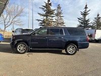 This Chevrolet Suburban boasts a Gas V8 5.3L/325 engine powering this Automatic transmission. Wipers... (image 1)