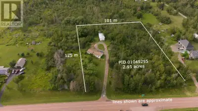 Opportunity awaits in this charming coastal community! Set on an impressive 2.95-acre lot, this prop...
