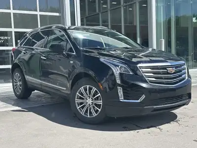 The 2019 Cadillac XT5 Luxury AWD, finished in black with a black leather interior, offers a refined...
