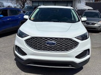 Command every journey in this pristine white 2024 Ford Edge SEL, boasting a sophisticated All-Wheel... (image 3)