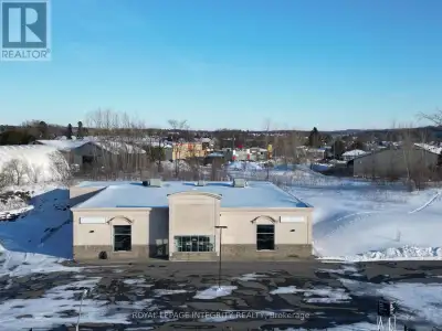 Modern, high-traffic 22,278 sq. ft. freestanding retail-industrial building situated on 3.54 acres i...