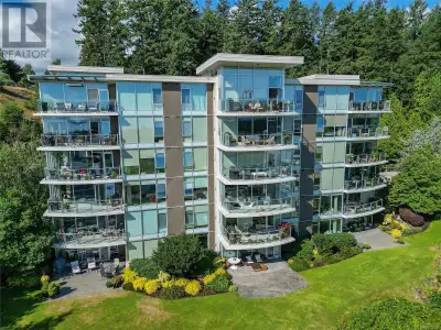 Premiere SE corner unit at SAYWARD HILL with exquisite updates, offering 1,860sf of elegant living s...