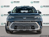 Meet the 2025 Volkswagen Taos Trendline 4MOTION, a stunning new gray SUV that excels in all-wheel dr... (image 1)
