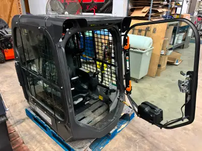 BOBCAT SKIDSTEER CAB ENCLOSURE $5900 PLUS TAX ………….UNIT LOCATED IN WINNIPEG MANITOBA, WE SHIP ANYWHE...
