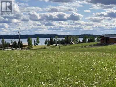 * PREC - Personal Real Estate Corporation. Fabulous lake views of Bridge Lake! This 2.1-acre view lo...