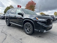 This 2025 Honda Pilot TrailSport in stunning Crystal Black Pearl beckons the adventurous spirit, rea... (image 1)
