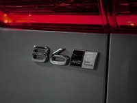 The 2023 Volvo XC60 Plus B6 Dark Theme is a high-performance Scandinavian SUV that combines a stealt... (image 9)