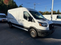 Ready for work. This mid roof transit has power options, divider, bluetooth, a/c, back up camera and... (image 1)