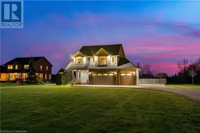 Stunning custom-built country home with heated pool and city conveniences nearby. Experience the bes...