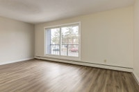 Amenities: Heat & Water Included • Spacious Rooms • Balconies Suite & Building: One-bedroom suites S... (image 3)