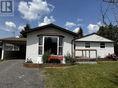 * PREC - Personal Real Estate Corporation. This charming 4-bedroom, 2-bath home offers comfort, spac...