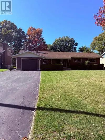 This custom bungalow, located in one of Thorold's sought-after mature areas, offers ample space with...