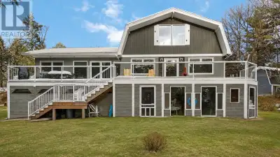 Visit REALTOR® website for additional information. Lakefront Privacy Meets Flexible Modern Living Li...