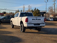The 2026 Ram 2500 Laramie Crew Cab Night Edition in Bright White combines aggressive style, heavy-du... (image 3)