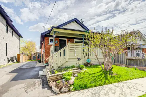 This brick bungalow at the border of Scarborough and East York offers an inviting and spacious, open...