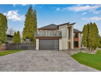 Stunning Custom-Built Corner Home in South Surrey. This exquisite south facing home on a 8,472 sq. f...