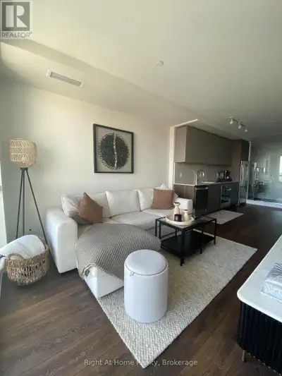 Suite 1205 offers a bright, clean, modern sunlit living space with all the features you could want!...