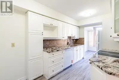 Beautifully Upgraded 861 Sq Ft Suite in Mississauga City Centre! Modernized in 2025 with vinyl floor...