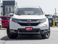 Discover refined comfort and confident capability with the 2017 Honda CR-V Touring AWD. Finished in... (image 1)
