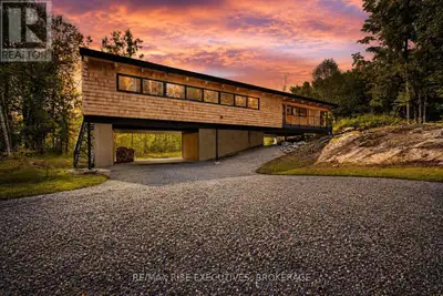 Built in 2024 and surrounded by a peaceful wooded landscape, this striking 4-bedroom, 2-bathroom hom...