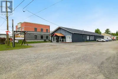 Attractive and welcoming 5,200 sf commercial/industrial building available for lease. This well-main...