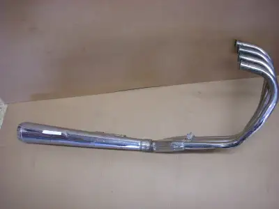 Have a Usable OEM exhaust for Honda CB 400-4 this exhaust is very solid but it has many dents and ru...