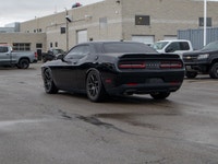 This 2016 Dodge Challenger R/T is powered by a classic 5.7L HEMI V8 engine paired with a smooth auto... (image 5)