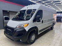 The 2025 Ram ProMaster Cargo Van in a clean white finish, equipped with front-wheel drive, is design... (image 9)