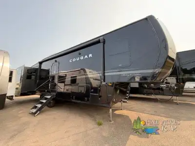 Keystone Cougar fifth wheel 320RDS MIDNIGHT EDITION highlights: Triple Slide Outs Rear Den/Living Ar...