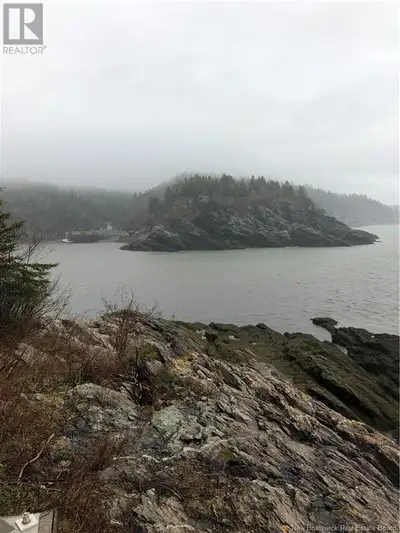 Discover the unparalleled beauty and potential of this oceanfront property, offering over 63 acres o...