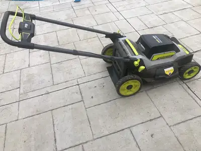 BATTERY POWERED "RYOBI" LAWN MOWER, View more