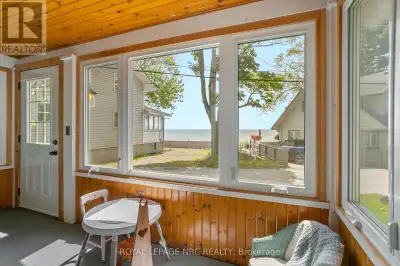 One of a kind! This is the bungalow dream cottage you have been waiting for! Tucked away on a huge,...