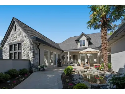 Never offered before - this architecturally designed home unfolds around a private entry courtyard w...