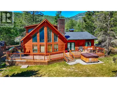 Located just outside Fairmont Hot Springs, BC, 4345 Teal Road is a charming A-frame retreat that ble...