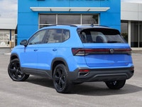 Elevate your daily drive with the strikingly vibrant 2026 Volkswagen Taos Comfortline Black Edition,... (image 3)