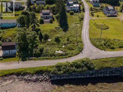 An oceanview lot full of potential! Imagine, design and build a cottage, tiny home, studio-loft, bun...