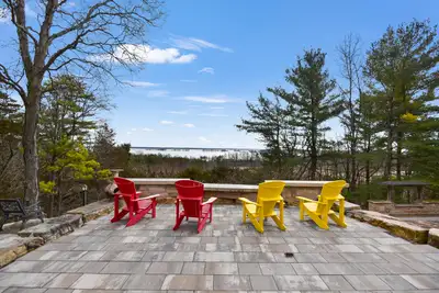 AN OPPORTUNITY TO LIVE AMONG THE WOODS AND WILDLIFE, ON A BLUFF OVERLOOKING THE ST LAWRENCE RIVER AN...