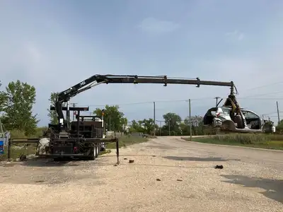 2006 Freightliner M2 with Hiab 144 B-3 CLX with rotating grapple. wired and wireless remote control....