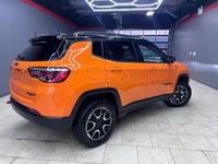 For a quick response please text 403-820-9940. AMVIC licensed business The 2026 Jeep Compass Trailha... (image 2)