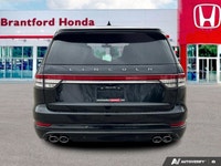 Recognized with an IIHS Top Safety Pick award, the 2022 Lincoln Aviator Grand Touring in elegant Bla... (image 4)