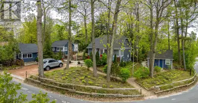 This unique 4-season property encompasses multiple structures & is situated across from the sandy be...